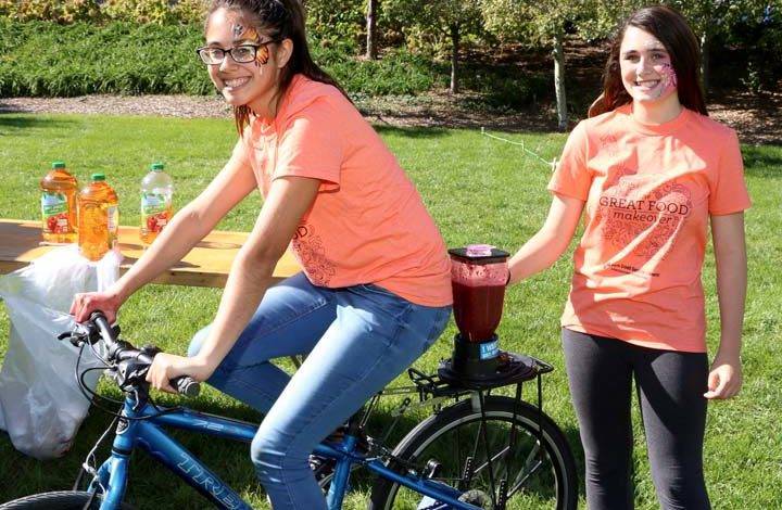 Making a smoothie on the blender bike. (Photo by Debra Kaplan)