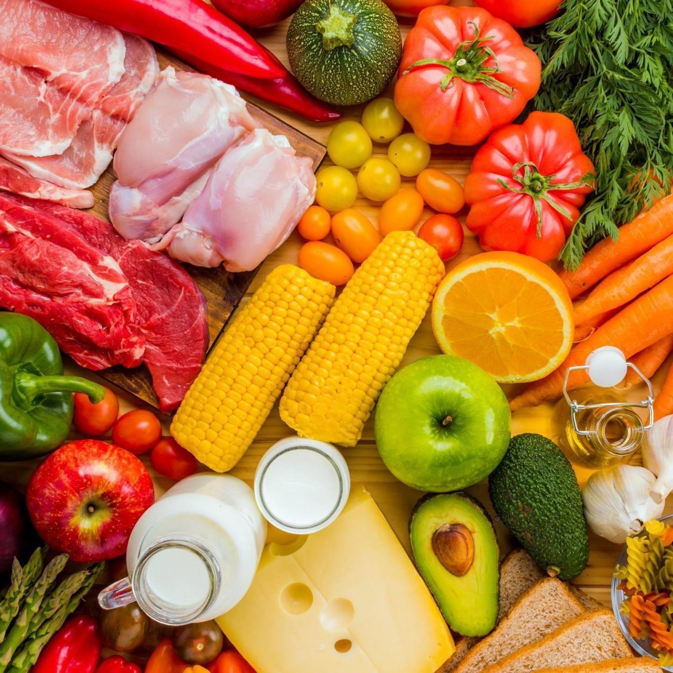 Different types of food from the food pyramid seen from above.