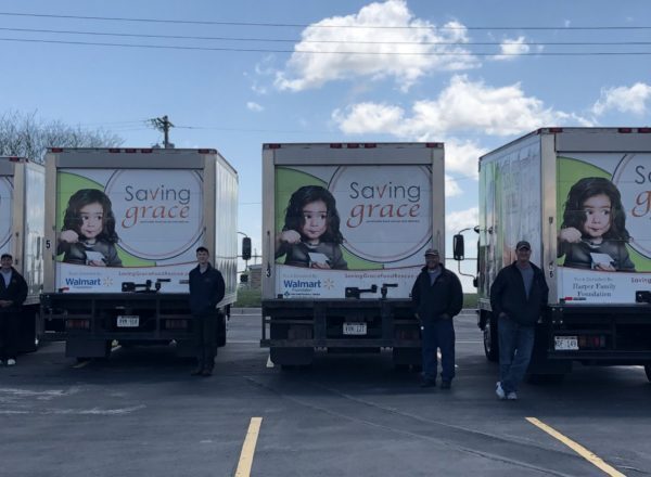 Four trucks and five drivers.